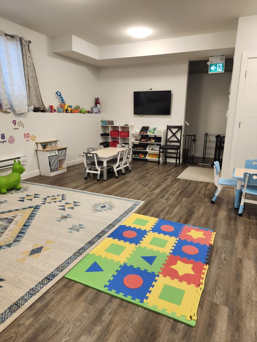 Colorful play mat and learning toys indoors